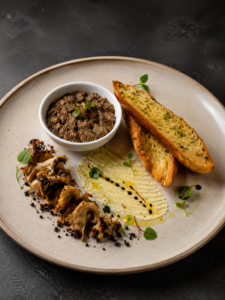 Gourmet mushroom dish with crostini